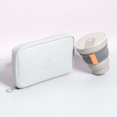 The OneNine5 x Hunu 'Go Again' Bundle. Including a OneNine5 Moeraki Grey Eco Essentials Pouch & a Hunu 12oz warm grey cup 