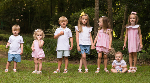 A group of children in Lullaby Set clothing