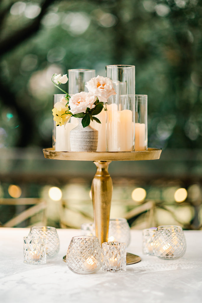 tiered candle centerpiece with budvases