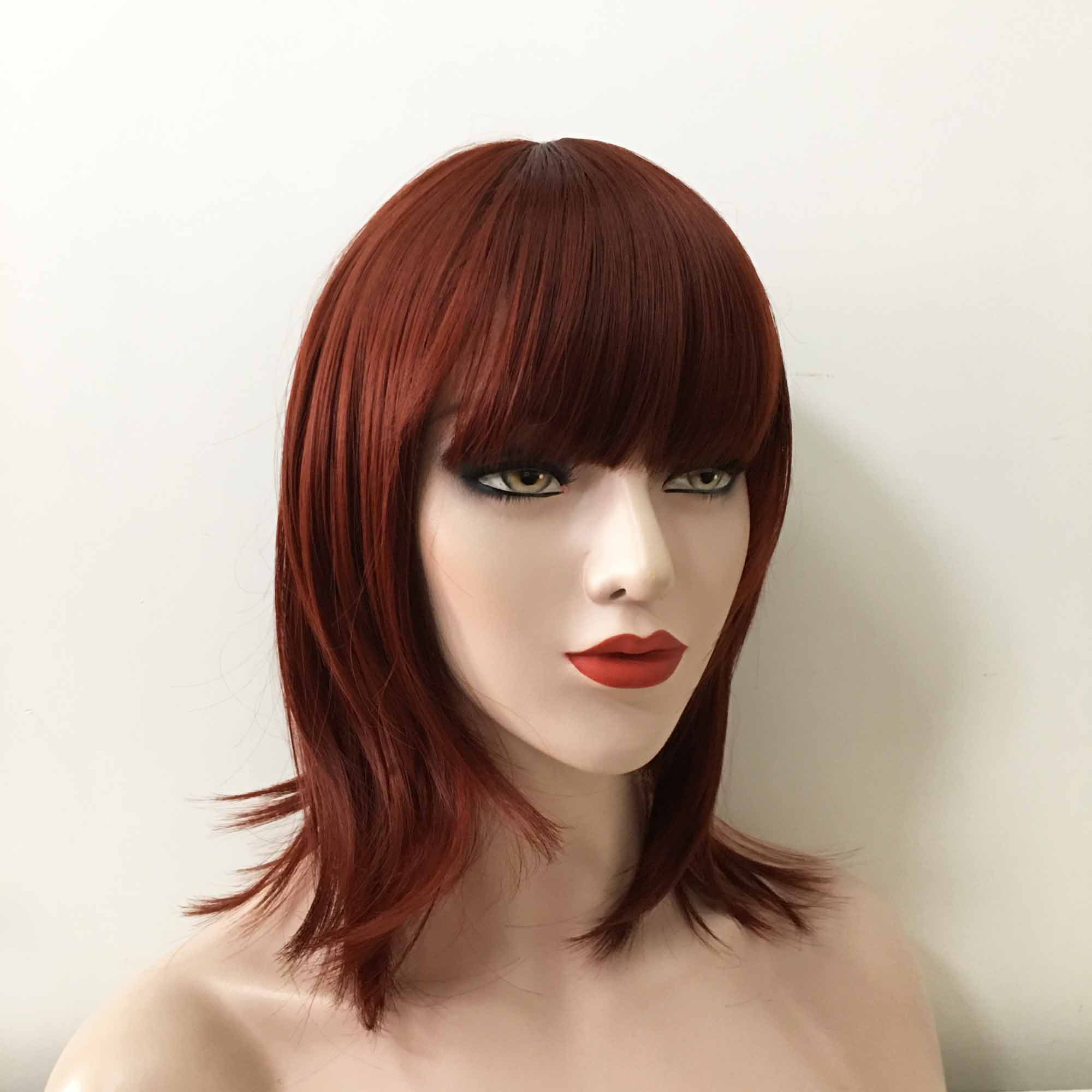 Image of Red blunt layers medium hair