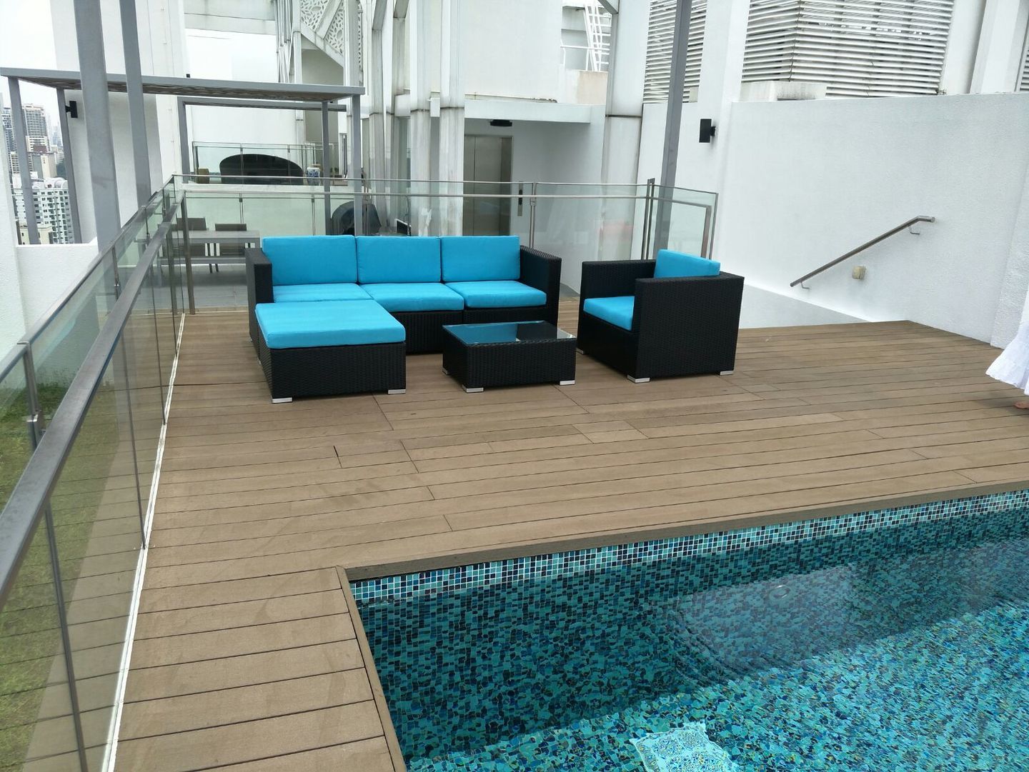 Outdoor Furniture beside a swimming pool in Singapore