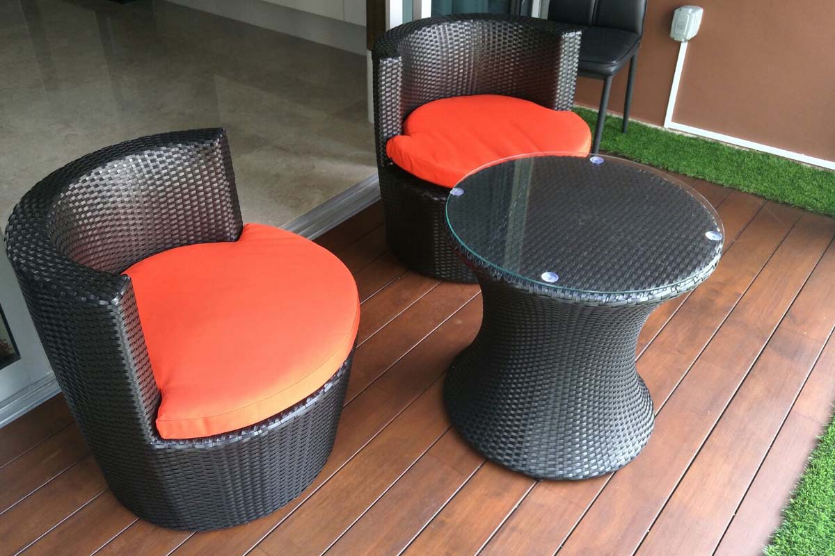 vase set in orange cushion
