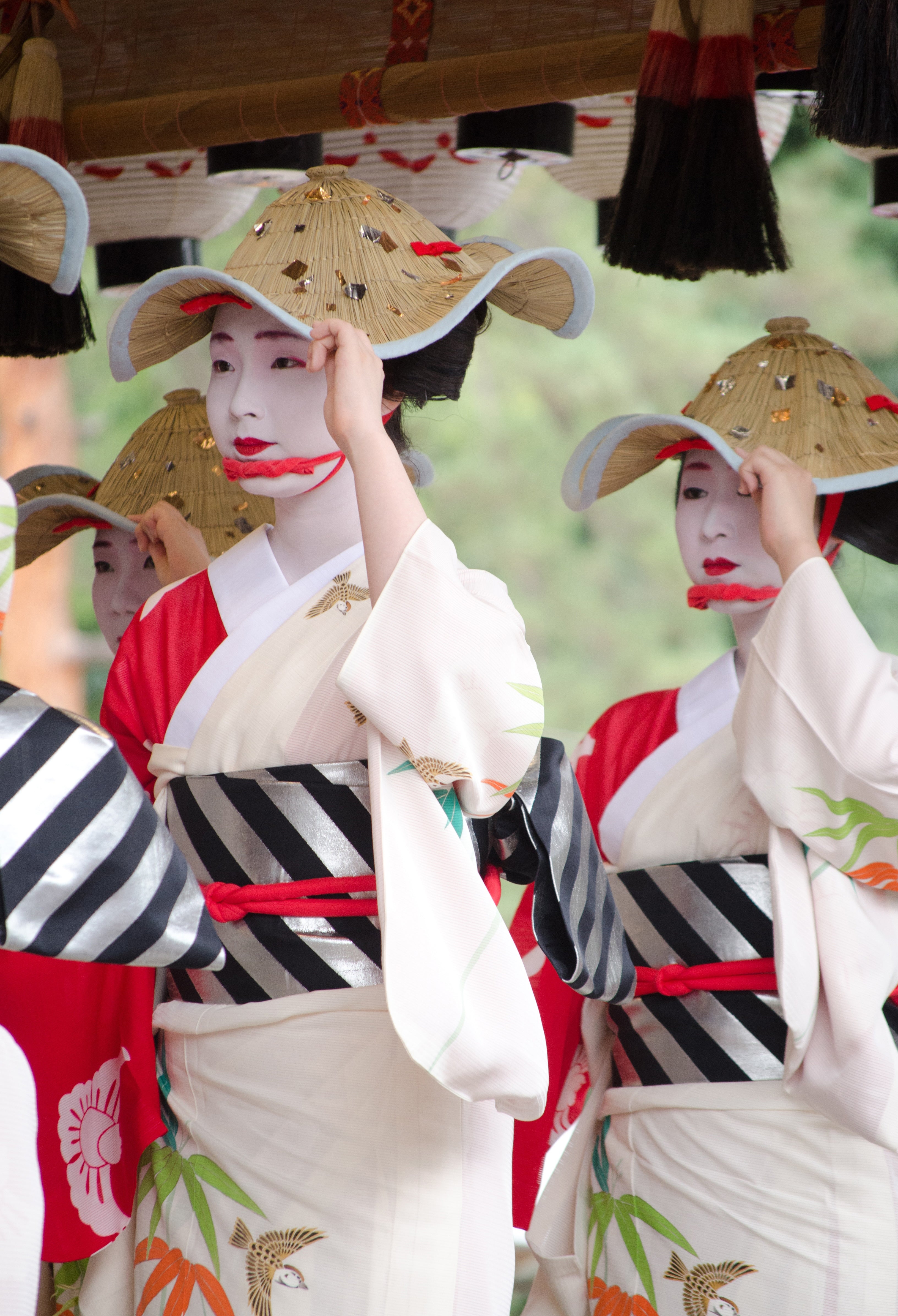 Japanese Geisha Wearing Traditional Outfits