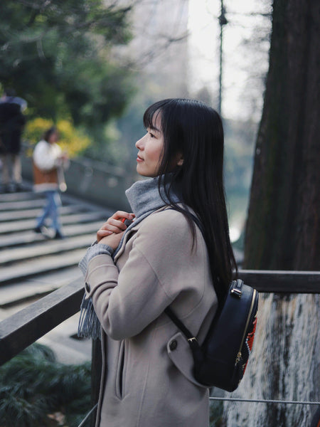 Elegant asian women with long coat