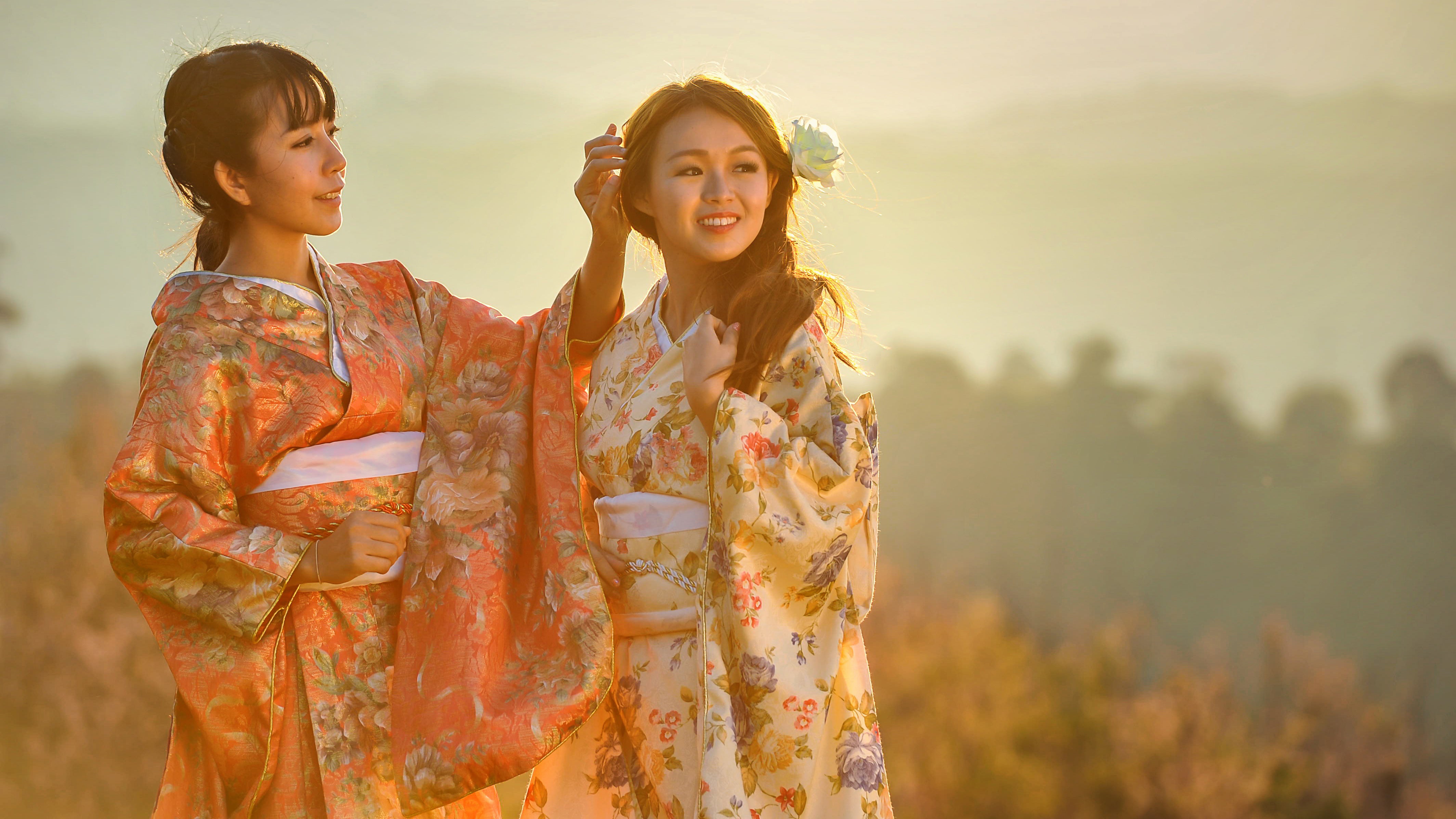 Two Cute Japanese Women Wearing Kimonos