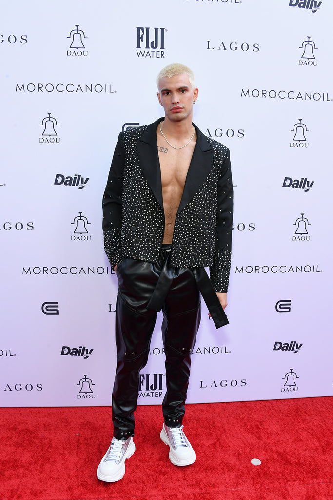 Model Benjamin Crofchick wearing ORTTU to Daily Front Row Awards