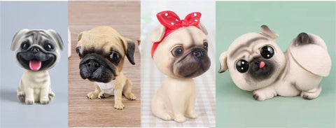 Image of four Pug Gift Bobbleheads