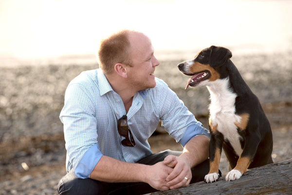 Matthew Wasmuth (Co-founder, PetKind) with his fur baby, an Entlebucher Mountain Dog.