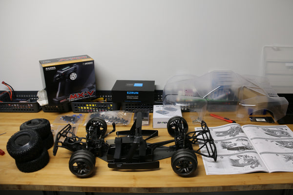 Parts on the table for the Escape RC car