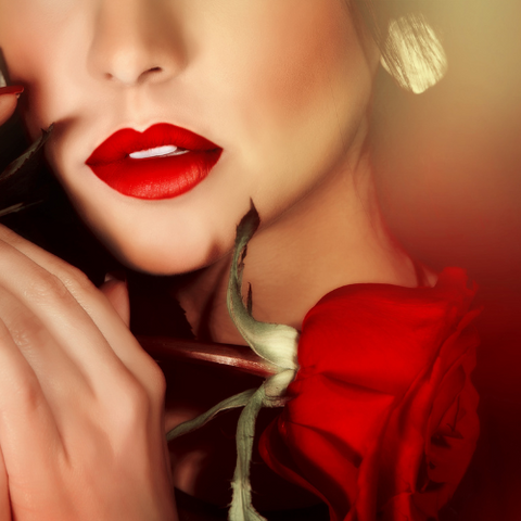 Woman with red lips w/ a rose