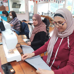 Muslim Women sewing
