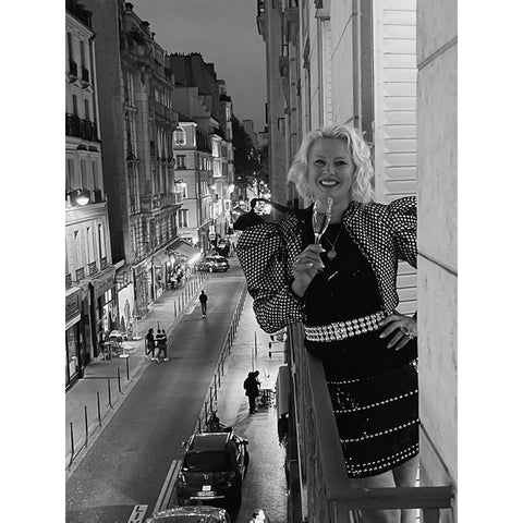 Artist Angela Morgan on a balcony