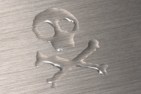 Aluminum in liquid form in shape of toxic symbol