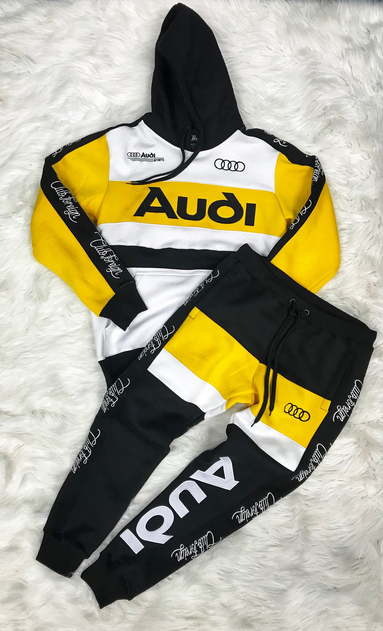 black and yellow sweatsuit