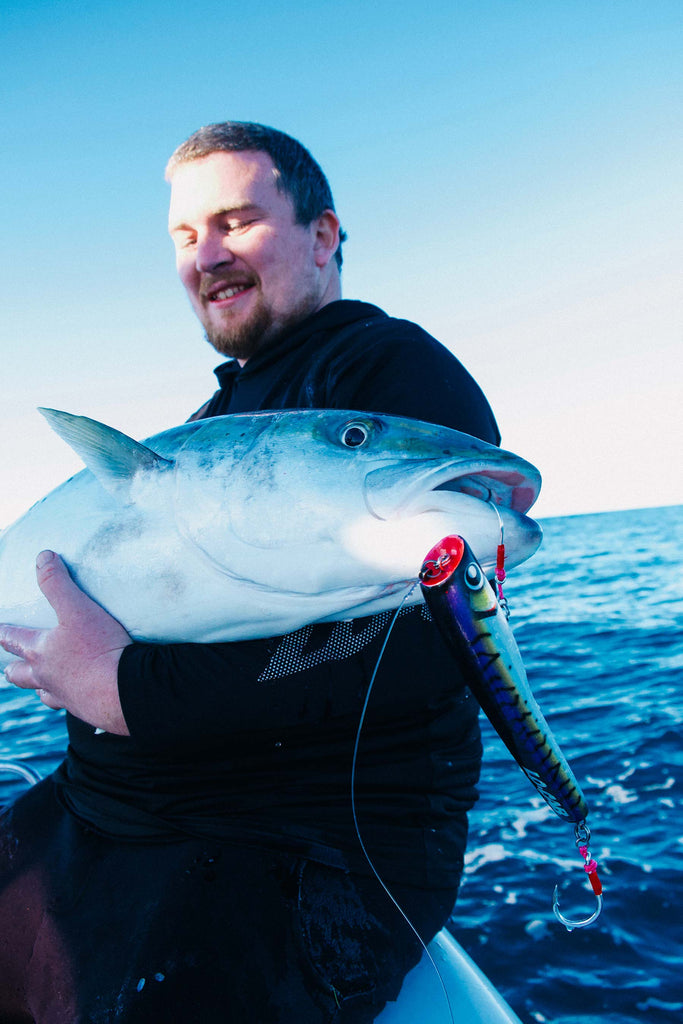 Mitch Tombleson with a fat Winter Kingfish, New Zealand