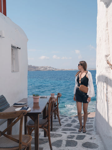 Luna Swim's owner Steph Twarog takes in the iconic alley in Old Town Mykonos