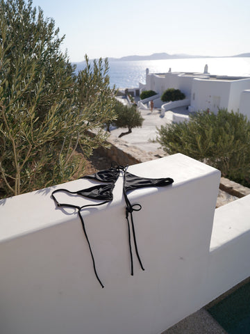 The Elisa in sustainable onyx top and bottom product shot in Mykonos