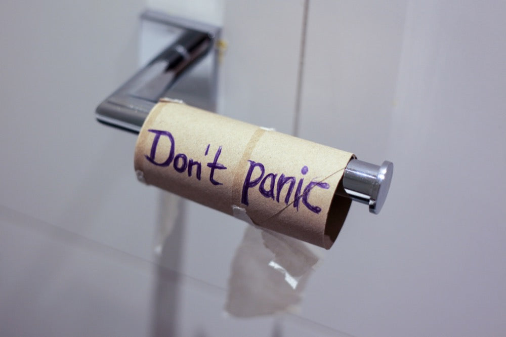 Toilet paper roll saying don't panic