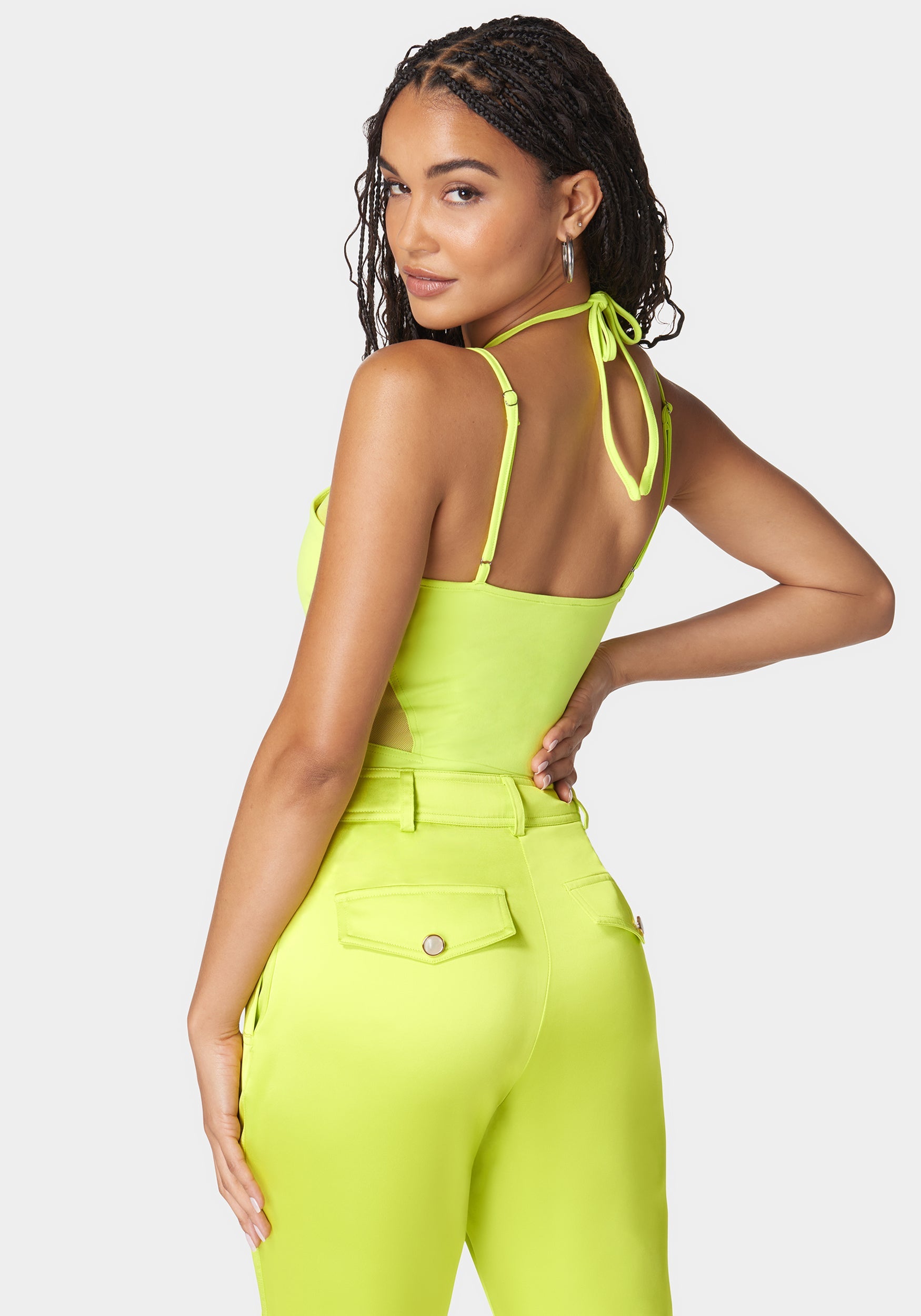 Shop Bebe Mesh Combo Strappy Halter Bodysuit In Cyber Lime