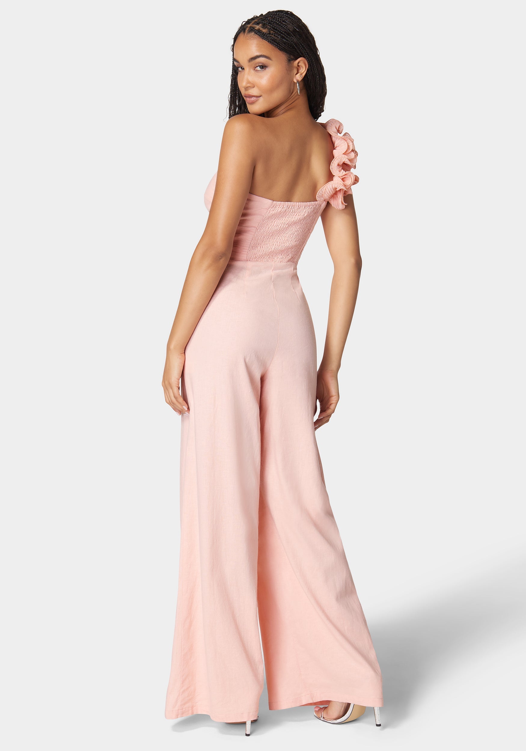 Shop Bebe Ruffle Shoulder Detail Full Wide Leg Jumpsuit In Apricot Blush