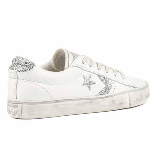 converse basse bianche pelle