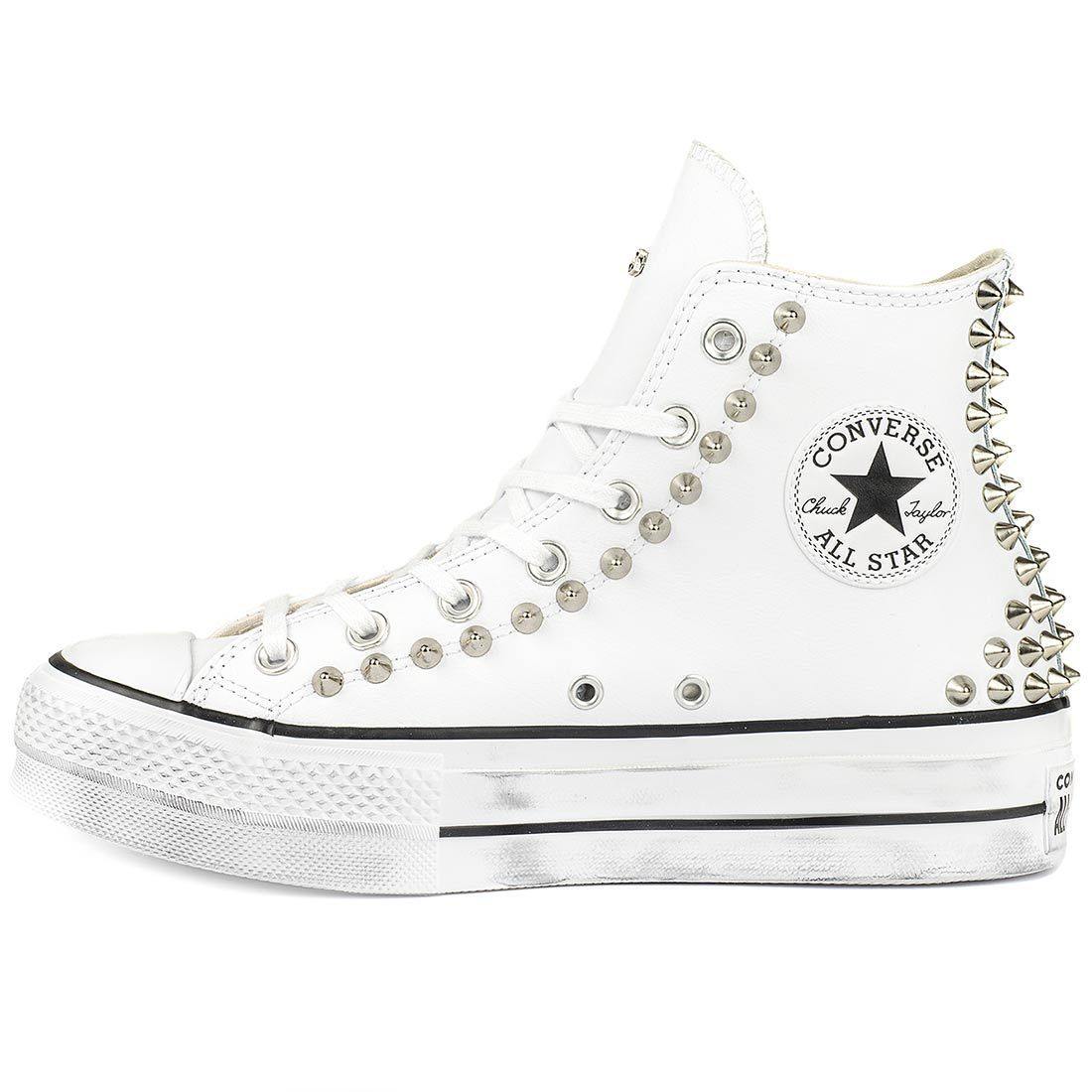 converse bianche pelle platform traduzione