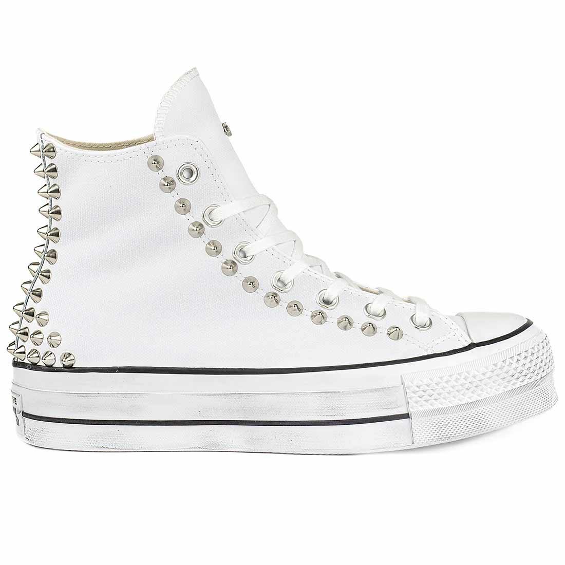 converse bianche alte platform traduzione