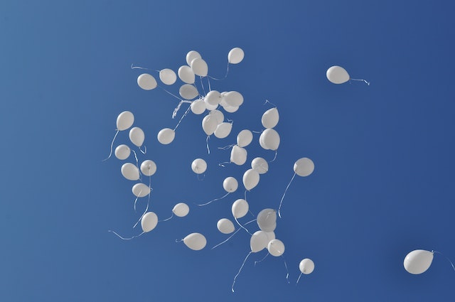 A lot of white balloons.