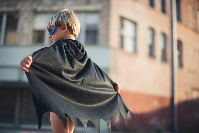 A child in a Batman costume.