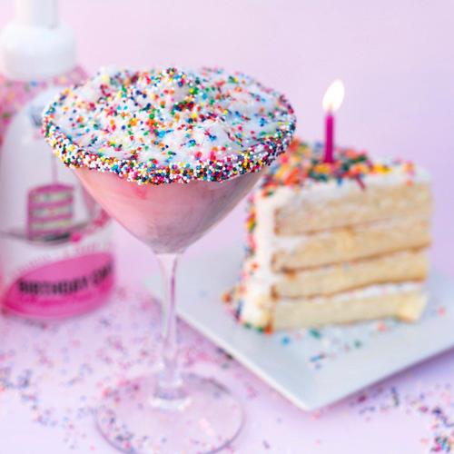 Birthday Cake Martini with a slice of cake.