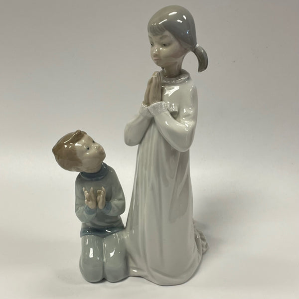 Porcelain Figurine of a Boy with a Candle by Zahir Lladro, Spain, 1970s for  sale at Pamono