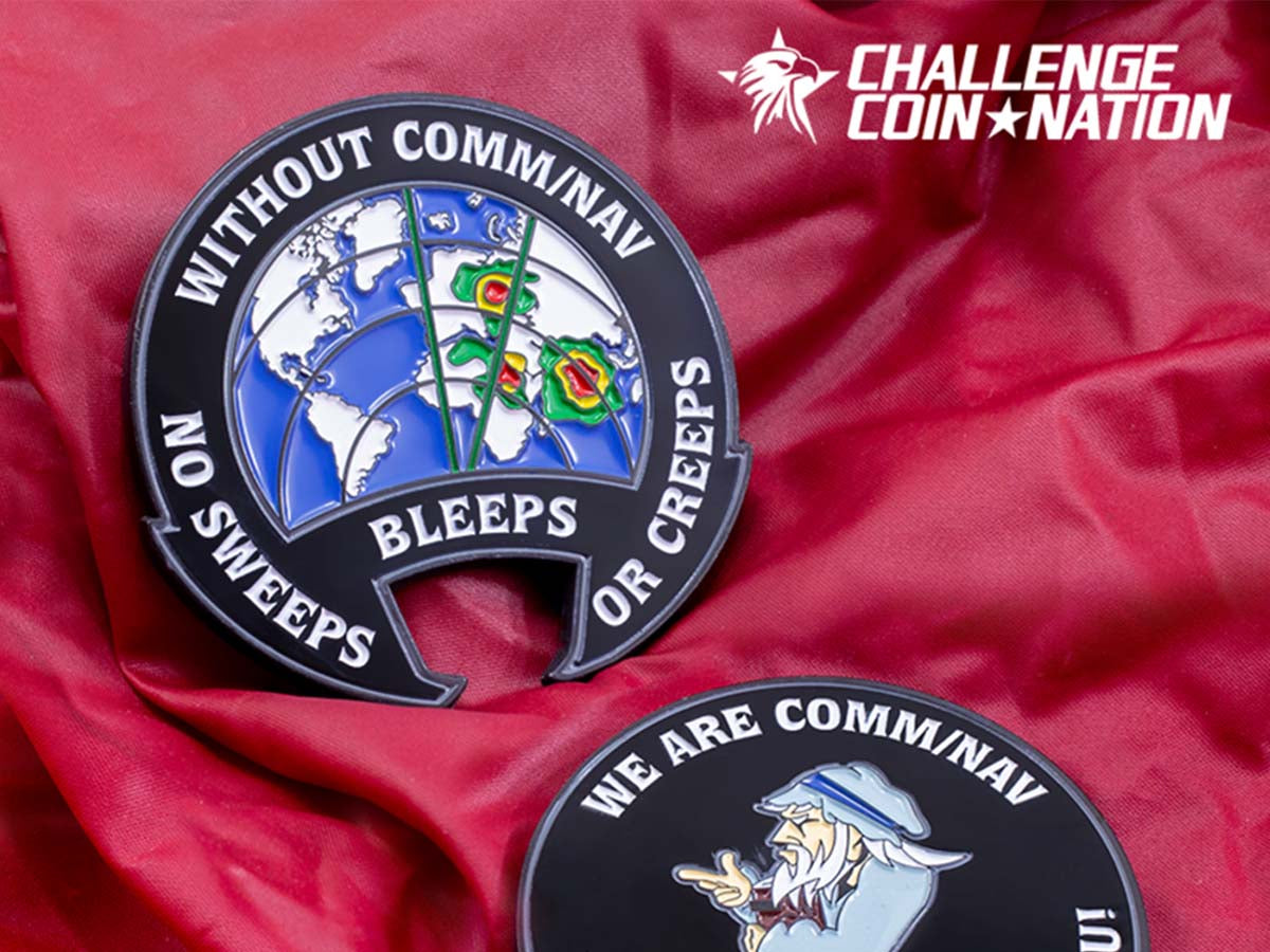 Challenge coin that says “Without Comm/Nav No Sweeps Bleeps Or Creeps” on the front and “We Are Comm/Nav We Are Better Than You”