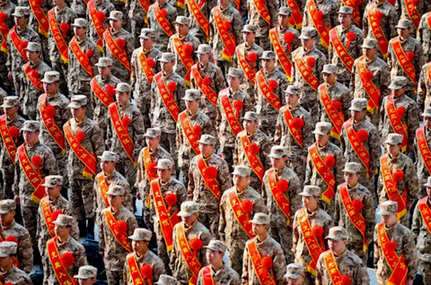 Chinese soldiers wearing custom reflective belts