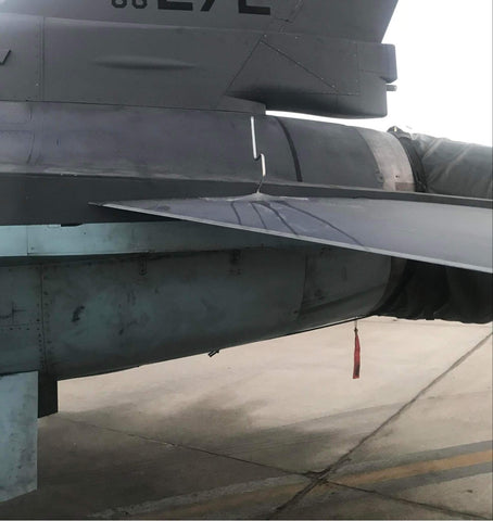 F-16 aircraft with a speed handle tool jammed in the horizontal stabilator