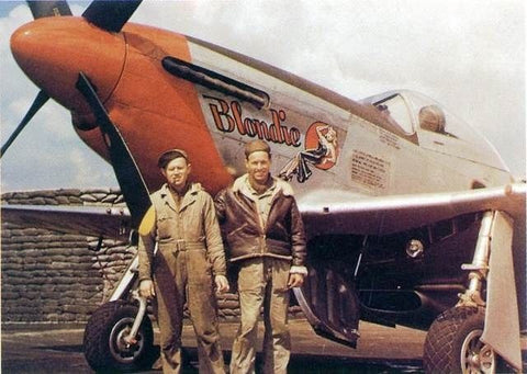 P-51 crew showing aircraft nose art