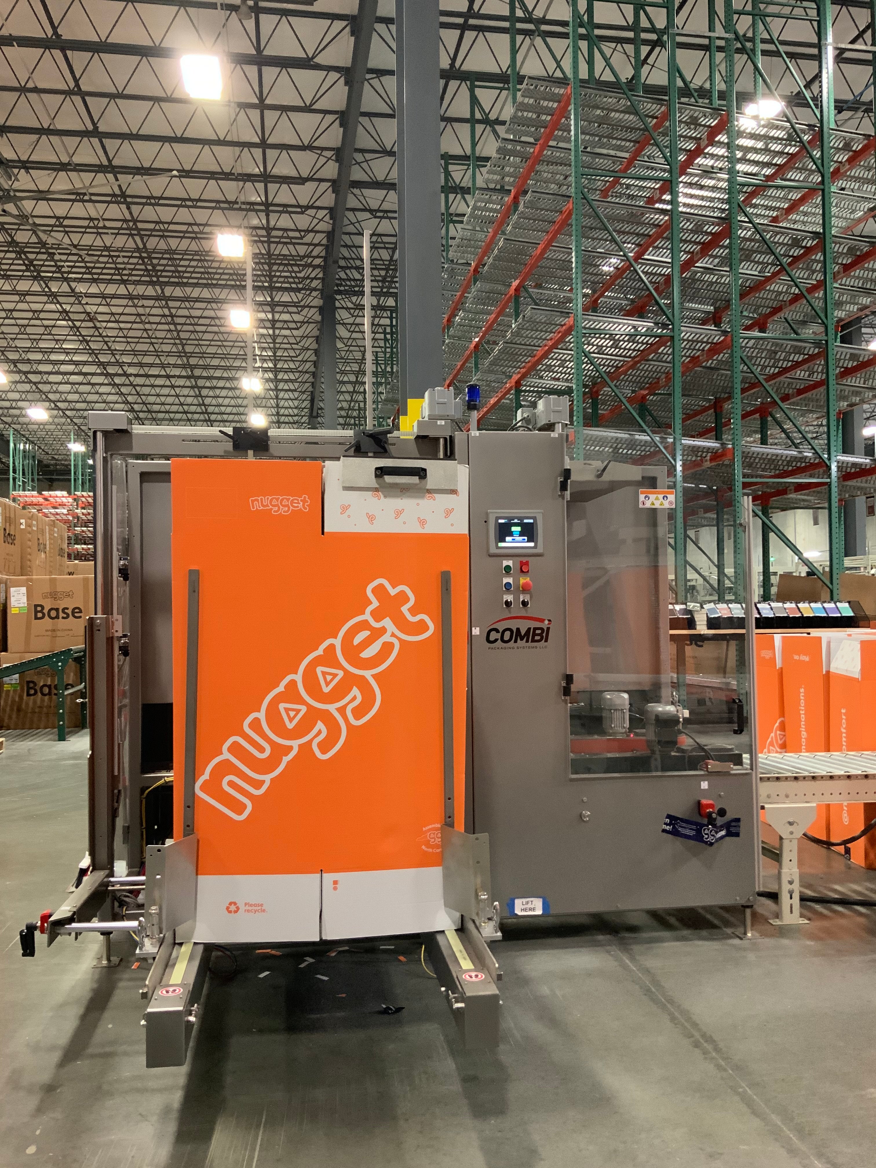 Box erector machine in Nugget warehouse factory