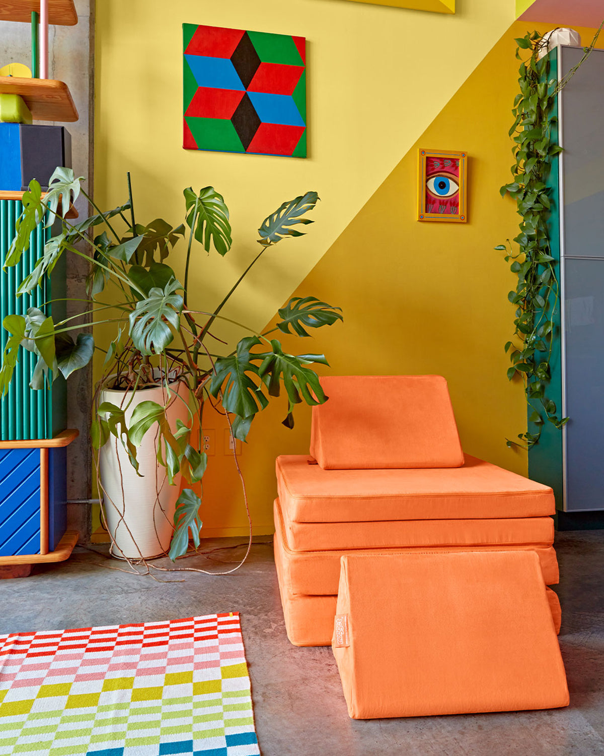 Nuggeteer orange play couch in colorful room