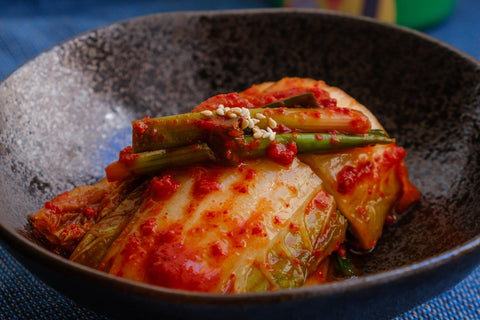 Kimchi in a bowl by Portuguese Gravity