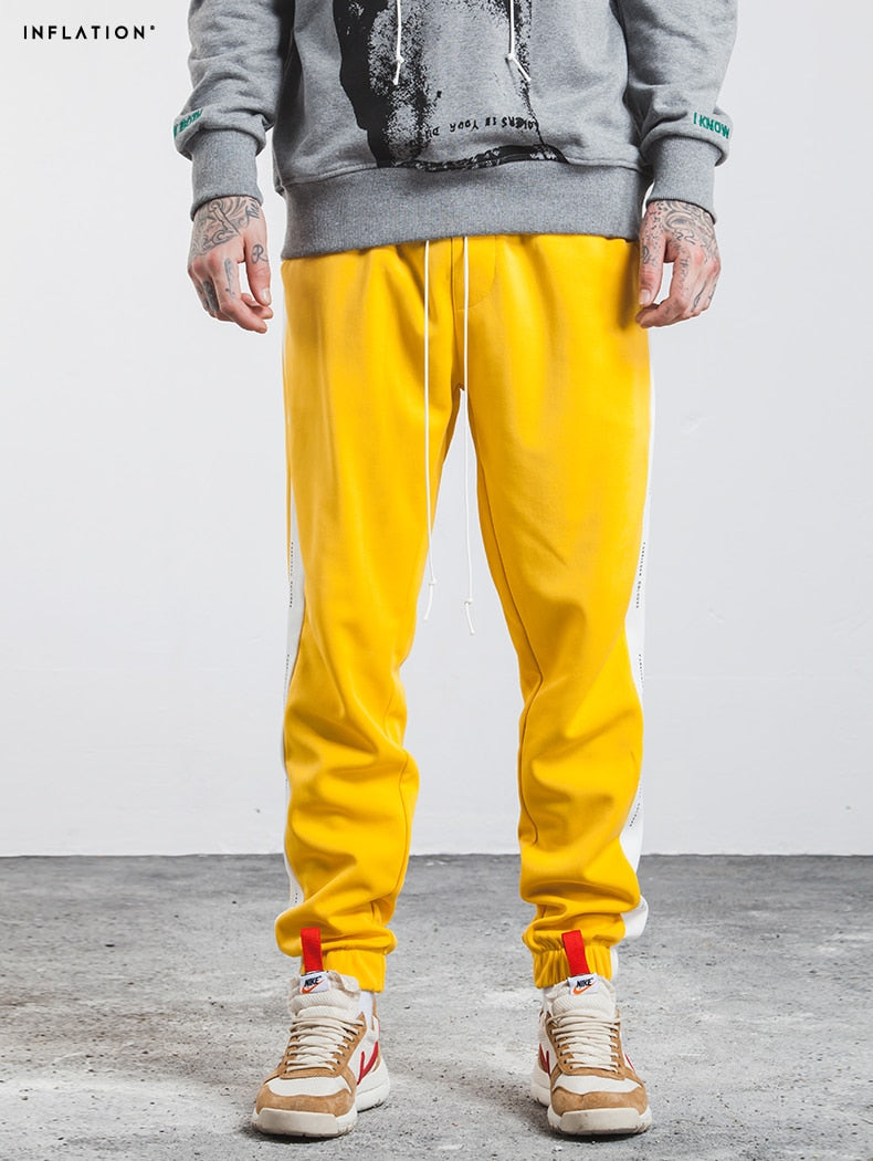 black joggers with yellow side stripe