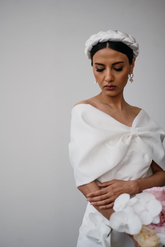 Zoe Rowyn off-the-shoulder modern bridal gown with oversized bow