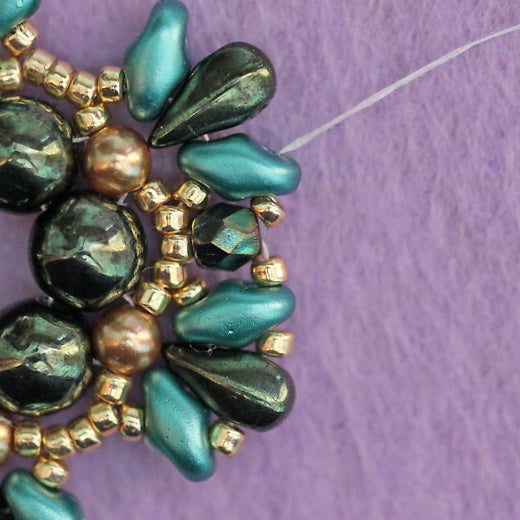 Pattern pendant “ELIZA” was developed by Yuliya Abelovich