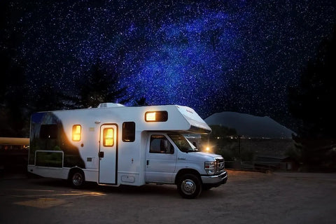 rv with lights on at night