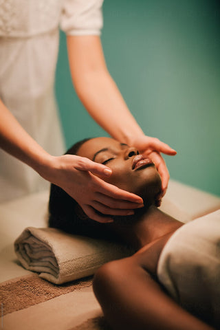 A woman enjoying her pampering and relaxing session at the spa. 