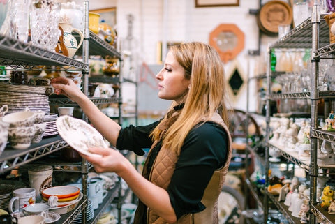 Ariel Davis of The Brooklyn Teacup sourcing for vintage china in a store