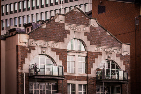 Georges and Co exterior with text on brickwork