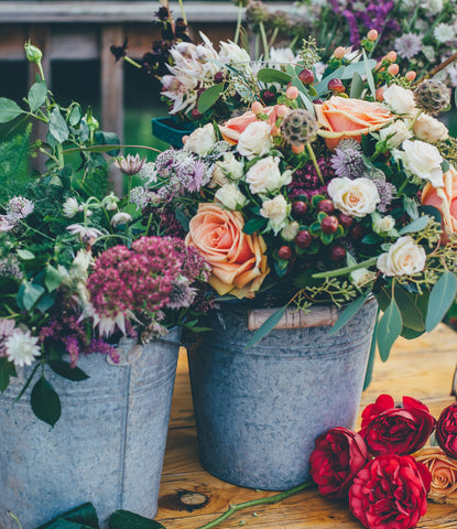 Flowers in buckets