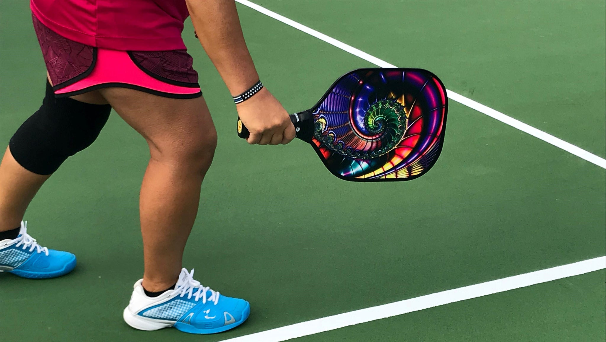 Pickleball racket: player with pickleball racket in hand