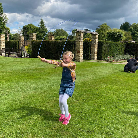 girl jumping with skipping rope