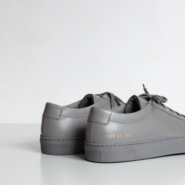 common projects dark grey suede