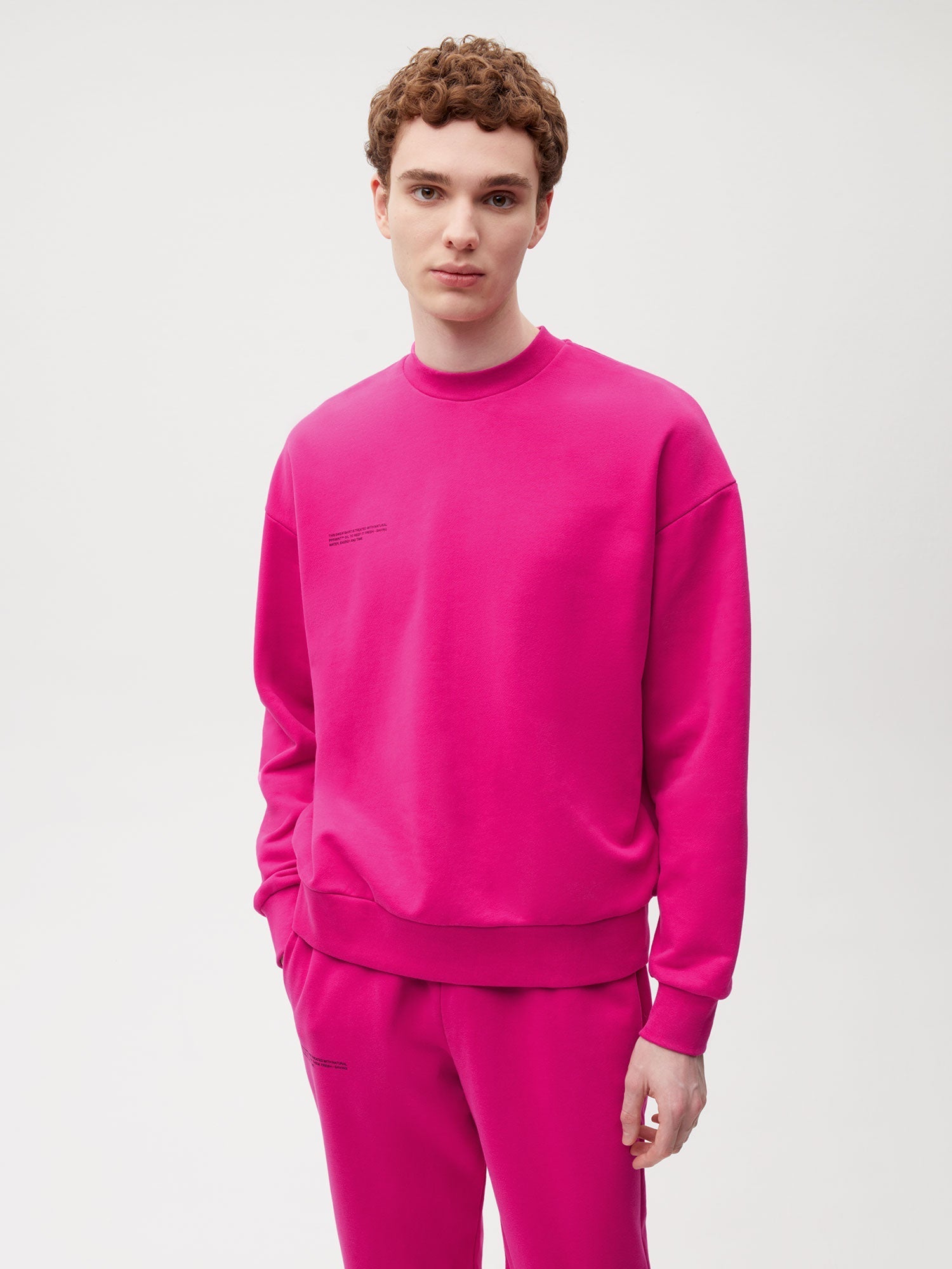 https://cdn.shopify.com/s/files/1/0035/1309/0115/products/Graphic-3-Sweatshirt-Foxglove-Pink-Male-1.jpg?v=1662476339